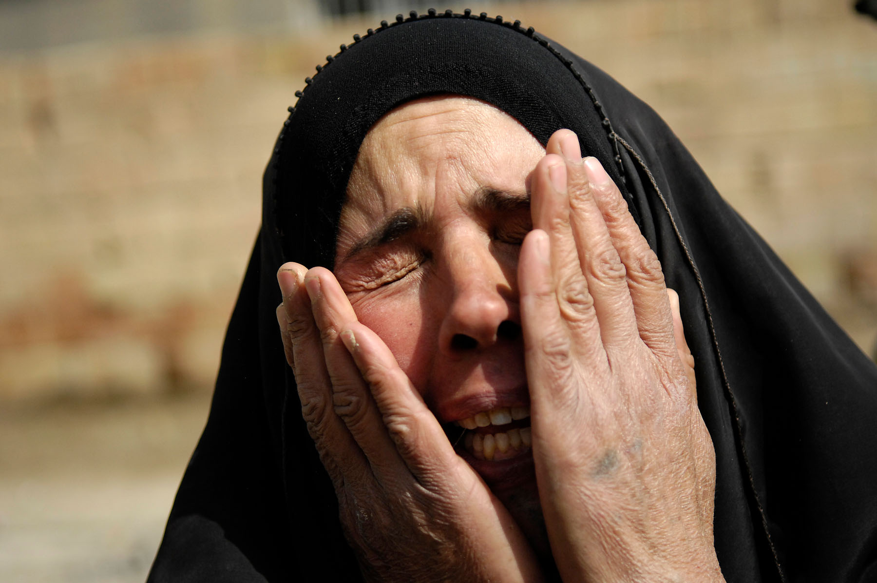 Operation Iraqi Freedom (Iraqi Woman Crying), photo by: SPC Holley Baker
